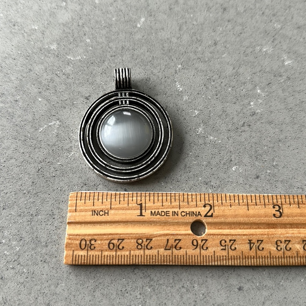 Lia Sophia silver and blue pendant